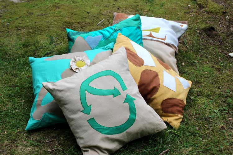 Multiple-throw-pillow-For-Laatumeininki-Kierratyskeskus-office-table-hands-setup-Susanna-Nousiainen