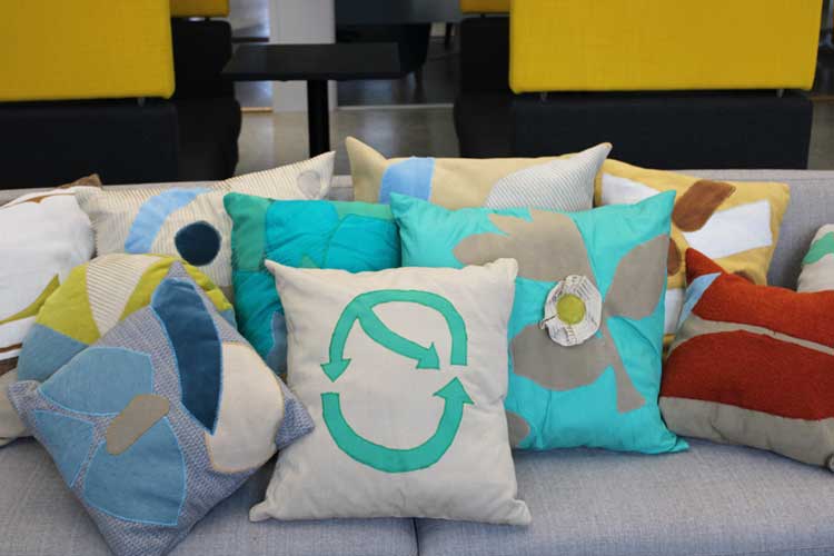 Office-all-throw-pillow-For-Laatumeininki-Kierratyskeskus-office-table-hands-setup-Susanna-Nousiainen