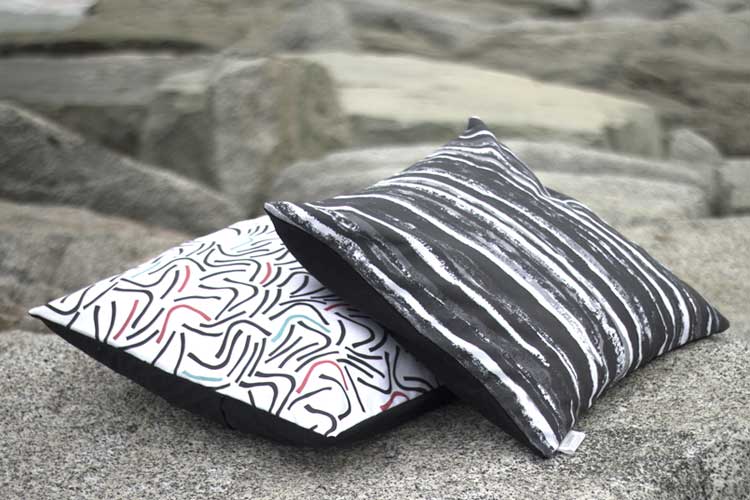 Surfacer pattern design for throw pillows by Susanna Nousiainen